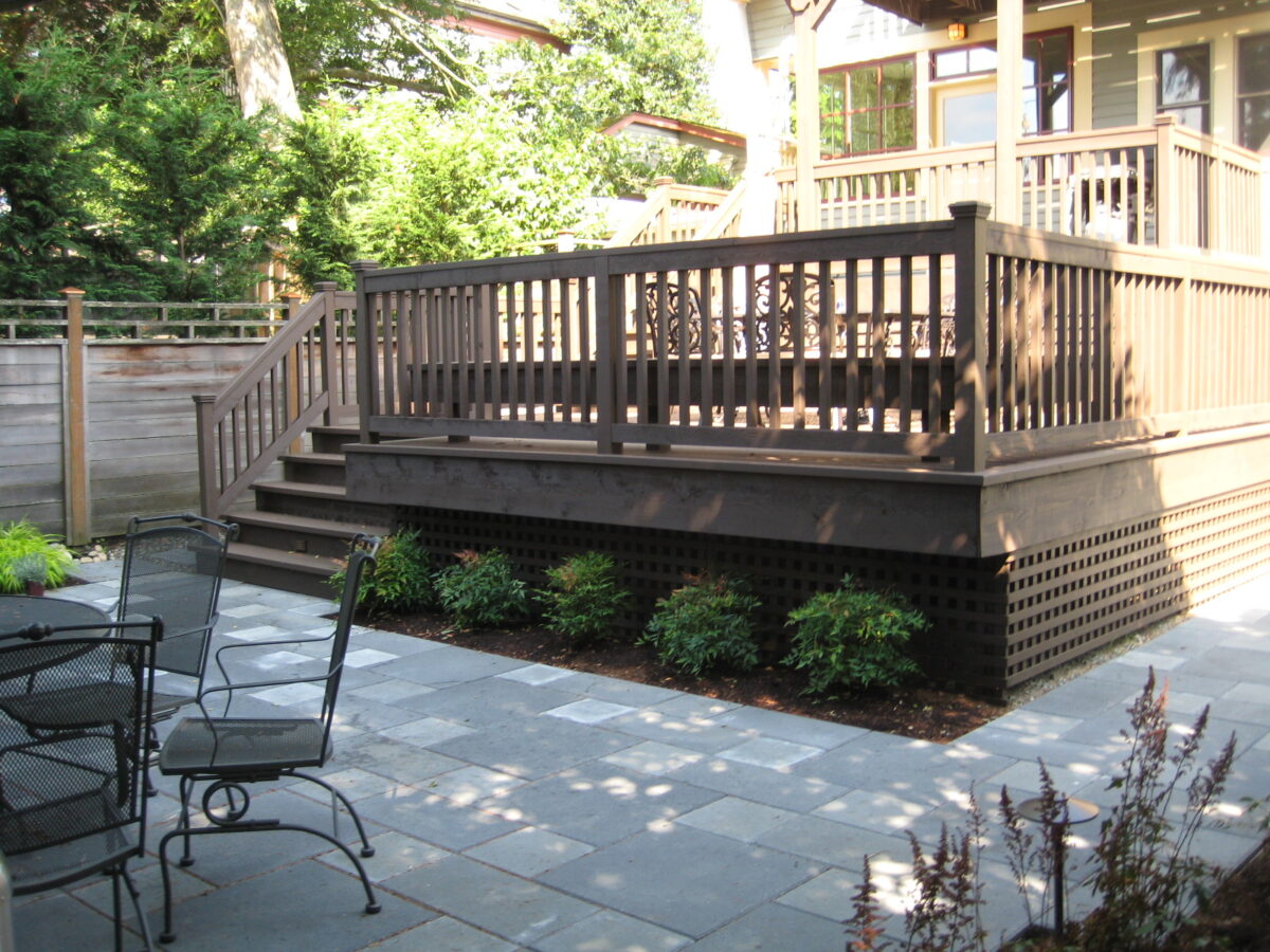 Seen here is a multi-level custom dark wood stained deck created by Bonney Lake Landscapes in Seattle, Washington.