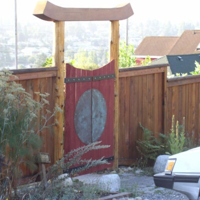 Custom asian-inspired fence gate and custom fencing built for a residence in the city of Seattle.